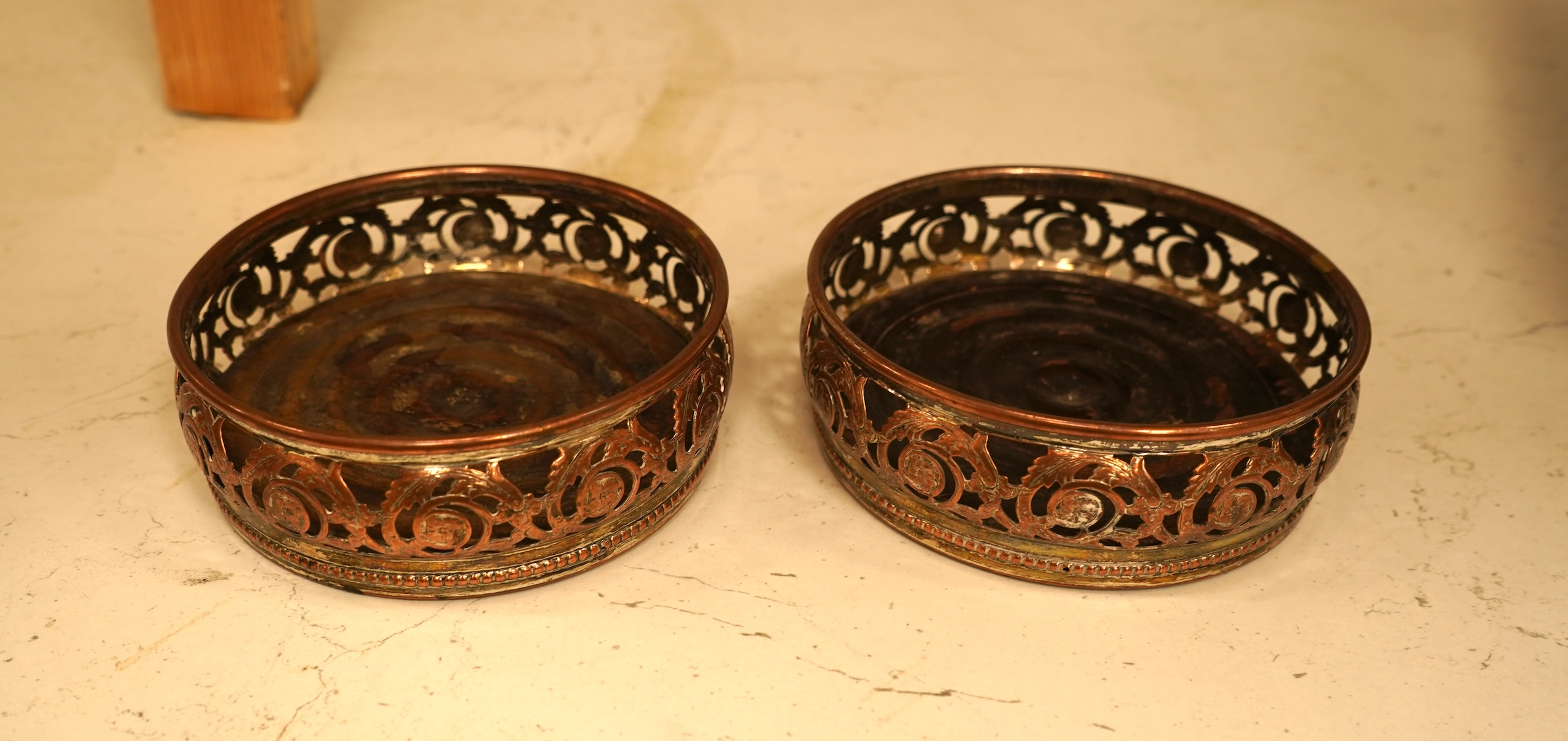 A quantity of assorted plated wares including a pair of 19th century wine coasters, antimony box, toast rack and flatware.
